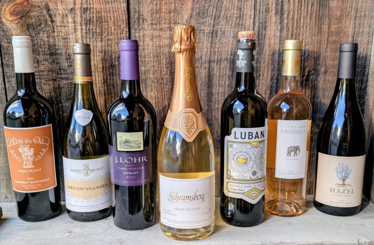 Wine at Woodstock Farmers' Market. seven bottles of wine in a row.