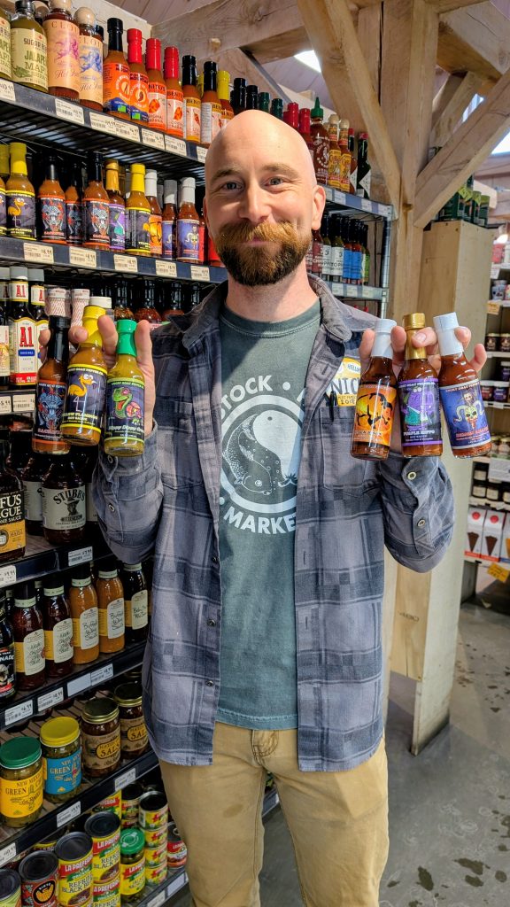 Angry Goat Pepper Co. hot sauce at Woodstock Farmers' Market.